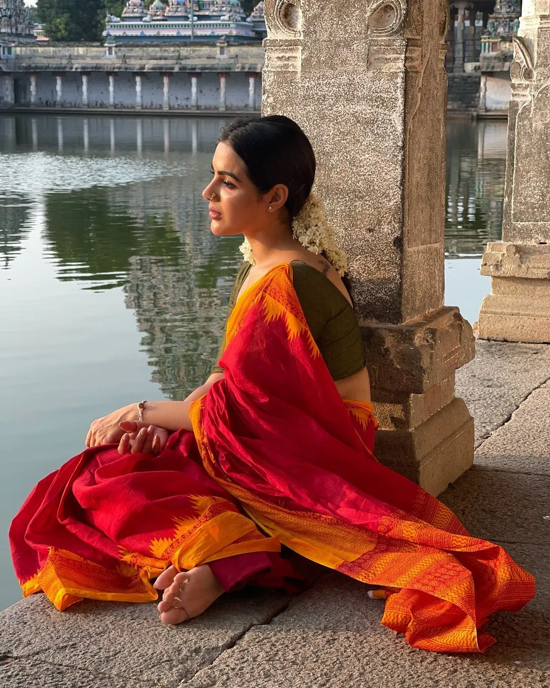 SOUTH INDIAN ACTRESS SAMYUKTHA MENON STILLS IN ORANGE SAREE 6